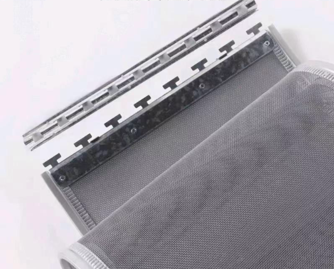 Track, hanging panel and reinforced mesh construction of a heavy duty magnetic screen door